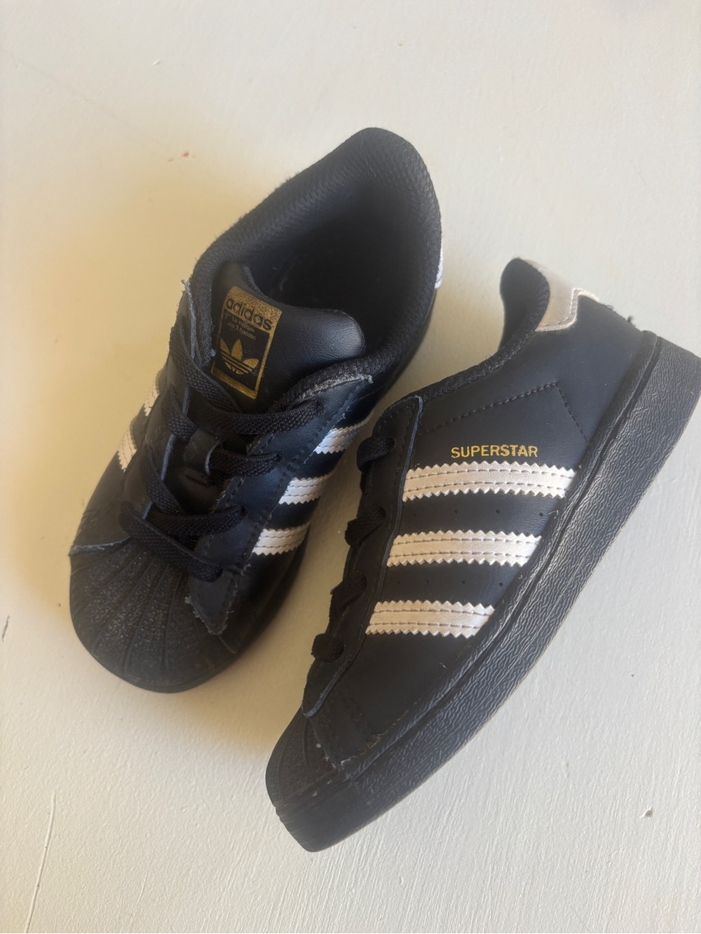 adidas Black and White Superstar Sneakers